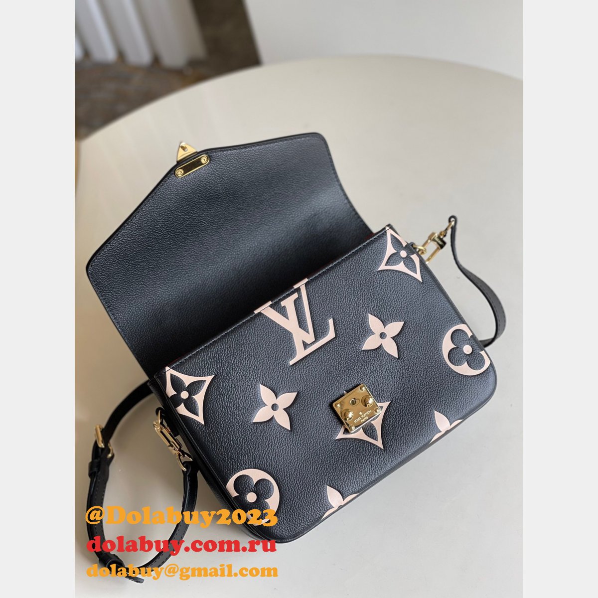Louis Vuitton Bicolor Monogram Empreinte Leather M45773 Pochette Métis