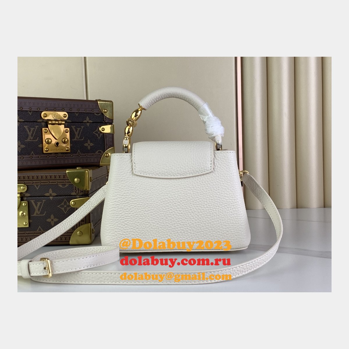 The Capucines M48865 M24989 M24698 Louis Vuitton Designer Replica Bag