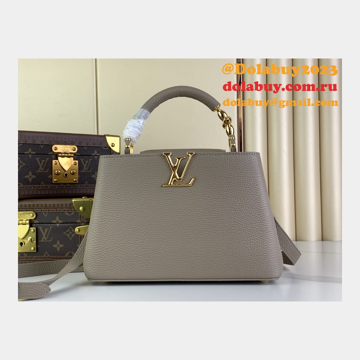 The Capucines M48865 M24989 M24698 Louis Vuitton Designer Replica Bag